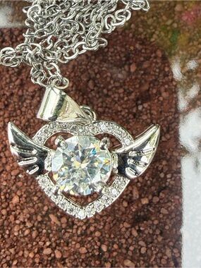 #122 18K White Plated Gold 1CTW Moisannite Winged Heart Pendant. GRA Certified